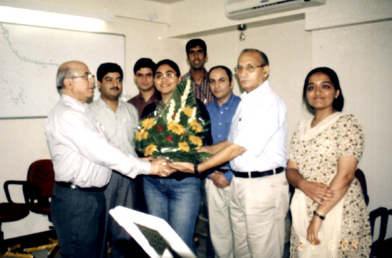 A Bouquet being presented to Dr. Om Kaul